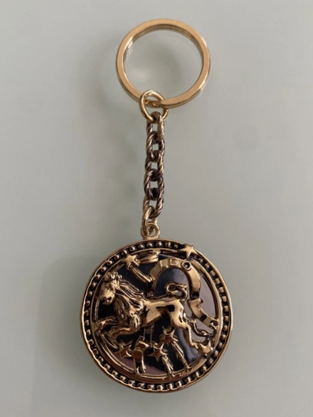 St. John “Happy Birthday “ Leo Gold-Toned Keychain